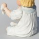 Porcelánová soška Bábätko s ponožkou  