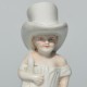 Starožitná porcelánová soška 