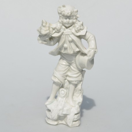 Starožitná porcelánová soška 