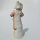 Starožitná porcelánová soška